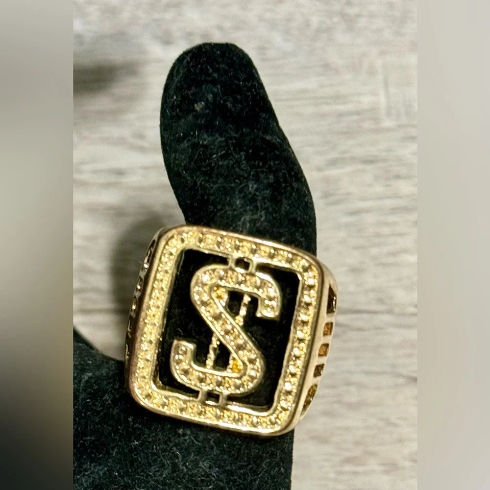 Sorella'Z men's metal ring with 18-karat gold plating. Featuring a dollar sign